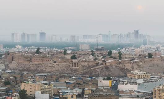 Erbil’s historic citadel with skylines obscured by a thick haze in the background. Photo Blind T. Abdullah