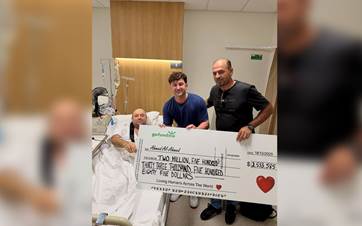 GoFundMe campaign initiator Zachery Dereniowski visited al-Ahmed in hospital on Wednesday, presenting a cheque totaling $2,533,585. Photo: Dereniowski's Instagram
