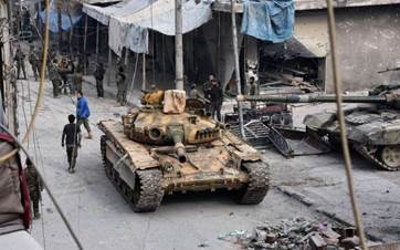 AFP file photo of a military tank in the streets of Syria's northern city of Aleppo.