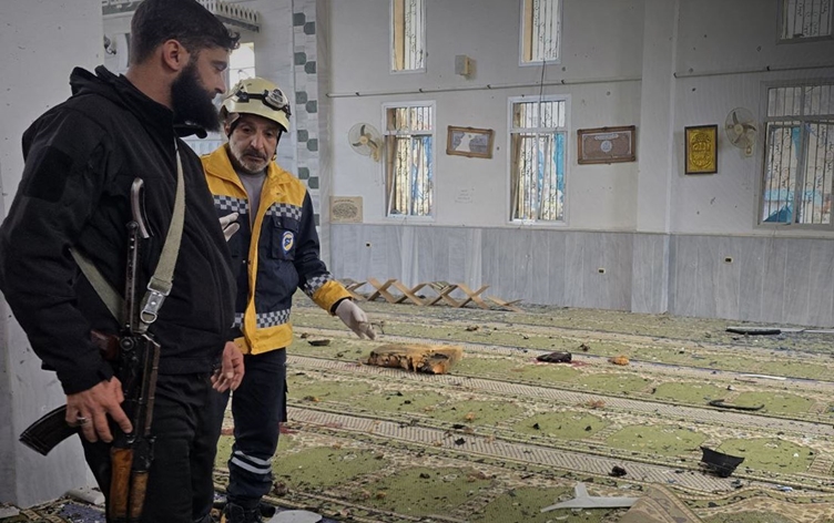 Security forces and emergency teams at a mosque after an explosion in Homs province, Syria, on December 26, 2025. Photo: SANA